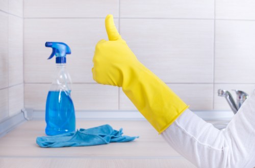 Deep cleaning upholstery in a Surrey Quays living room